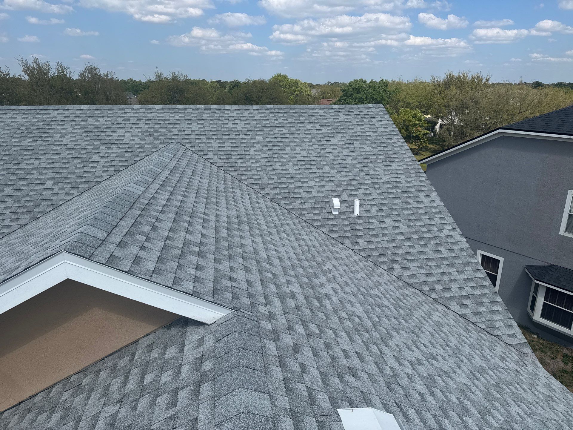 A finished residential roof by Align Roofing Solutions